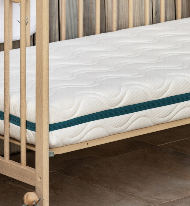 Housse de matelas bébé 60x120cm - 70x140cm Cocolatex® avec ouatinage laine biologique