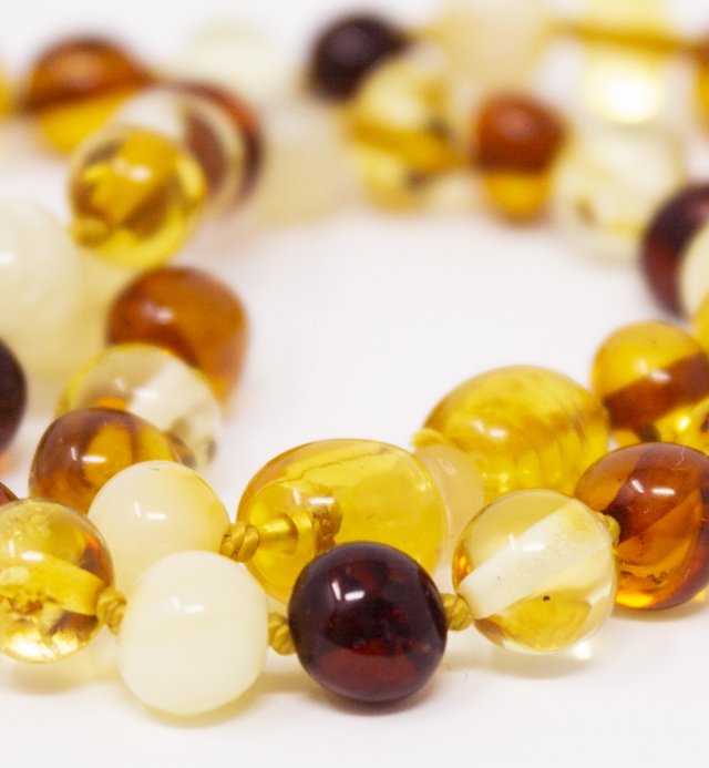 Amber necklace for baby with secure clasp Kadolis