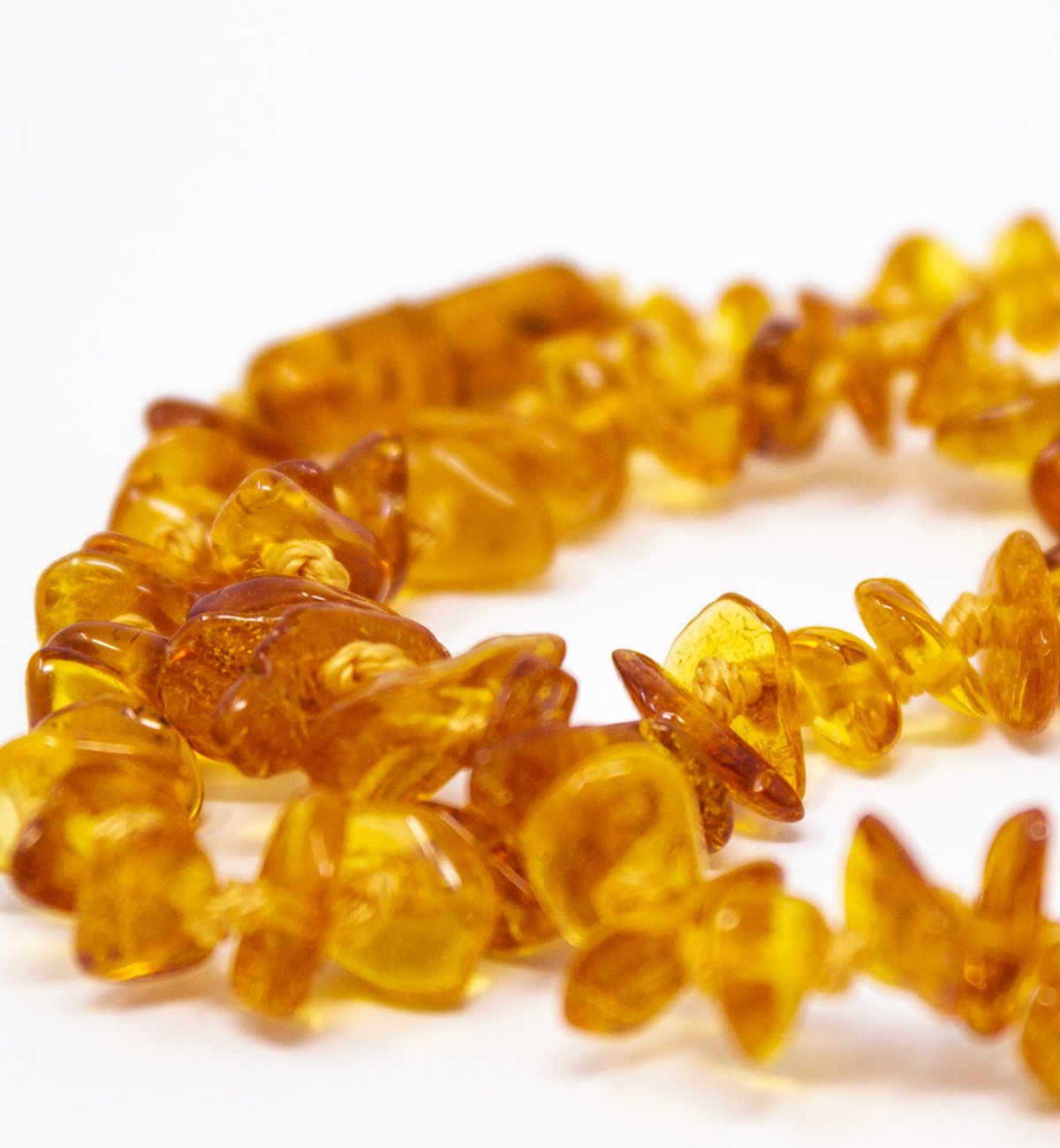 Honey-coloured amber baby necklace with Kadolis safety clasp